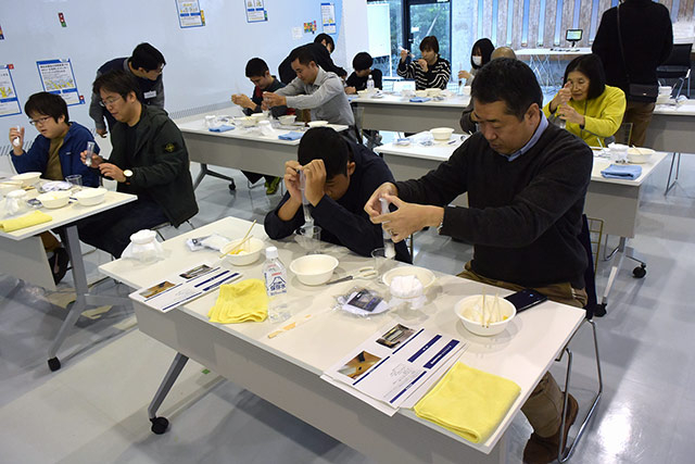 Participants focused on ink filtration experiment
