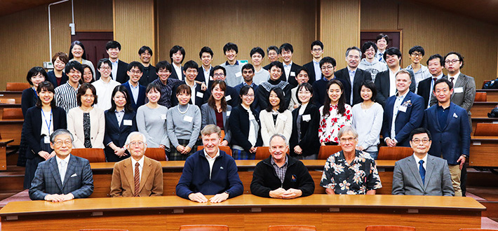 Students, faculty members, and staff members involved in the symposium