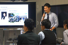 Matsuo giving a presentation about his visit